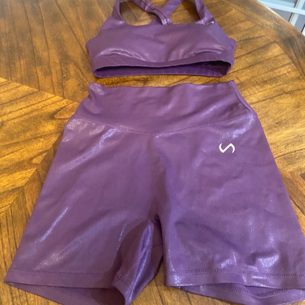 TLF workout apparel, size small sports bra top and size medium bottom shorts